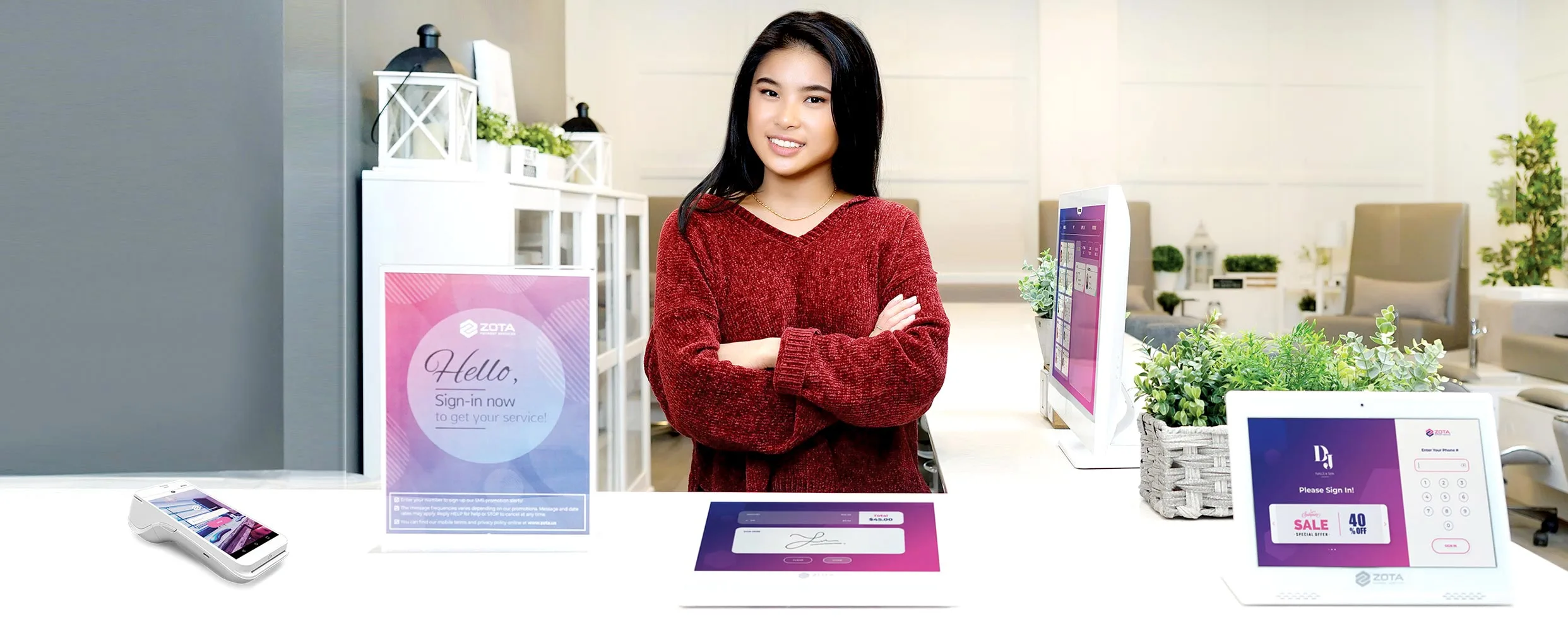 Home-bg-2 Zota Best Vietnamese Salon POS with sign-in tablet, payment terminal, and service management interface, used by a salon staff member.